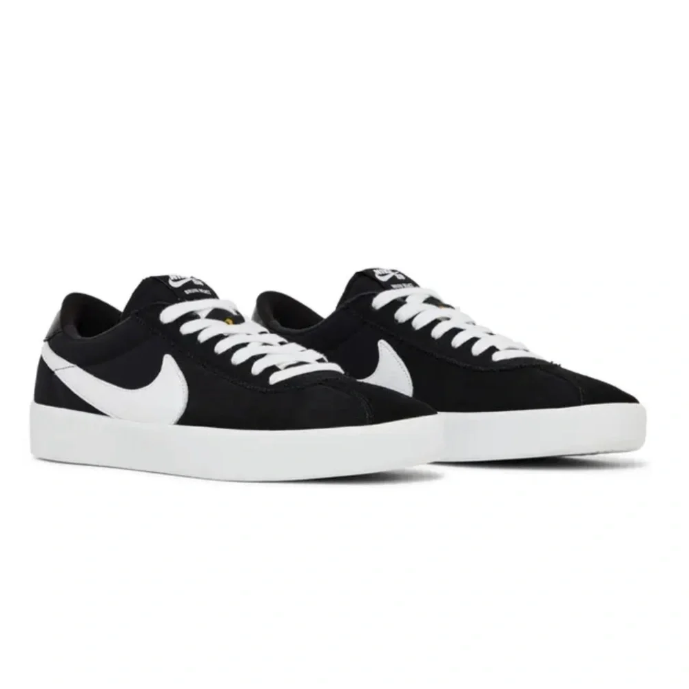 Nike bruin react sb Nike Black and White Athletic Shoes